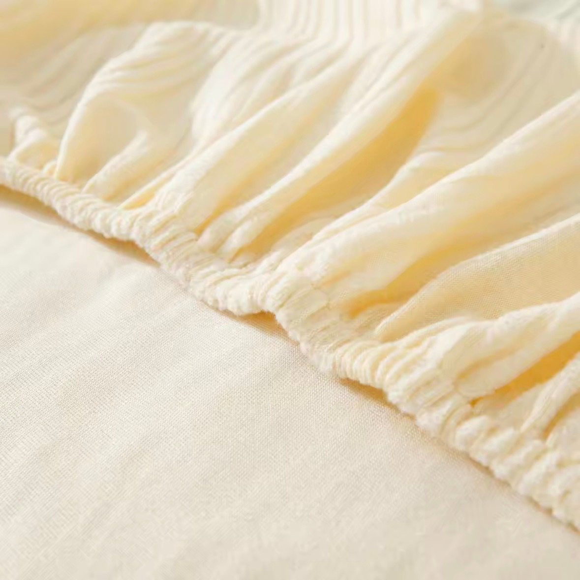 Housse de Canapé Texturée Extensible Élégante